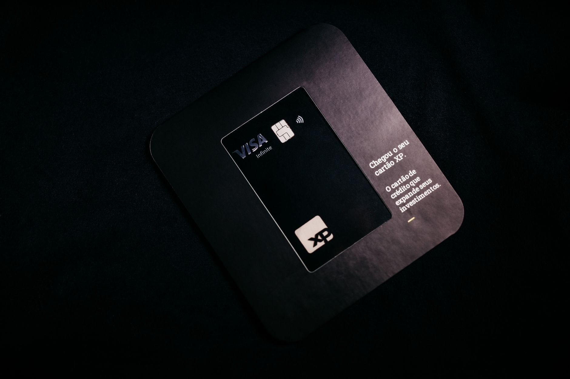 Premium black membership card on dark background — Aurelux VIP status.